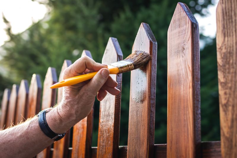 Painting a fence